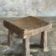 Small stool, square solid teak side table with a curved seat.