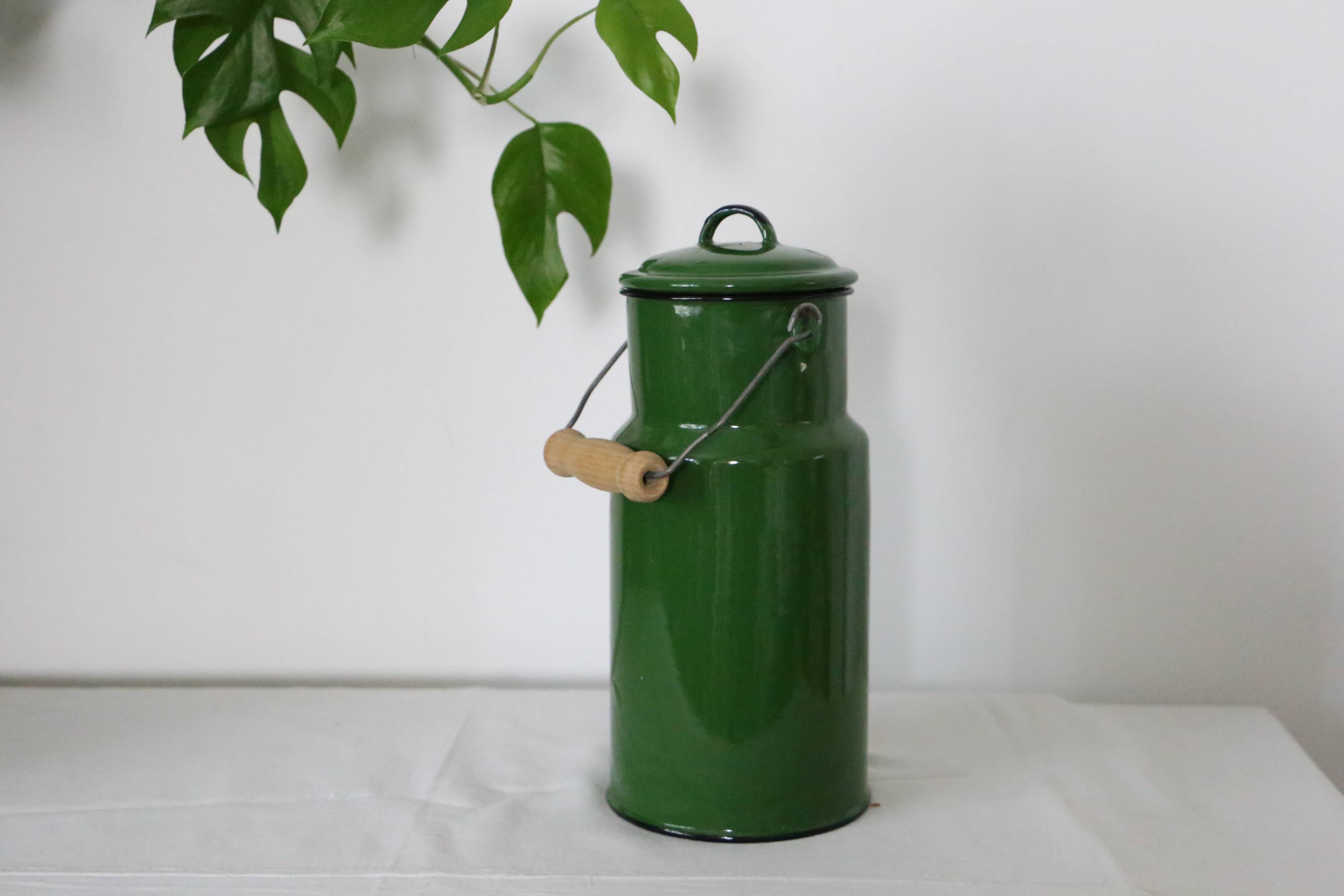 Enamelled metal milk jar, vintage