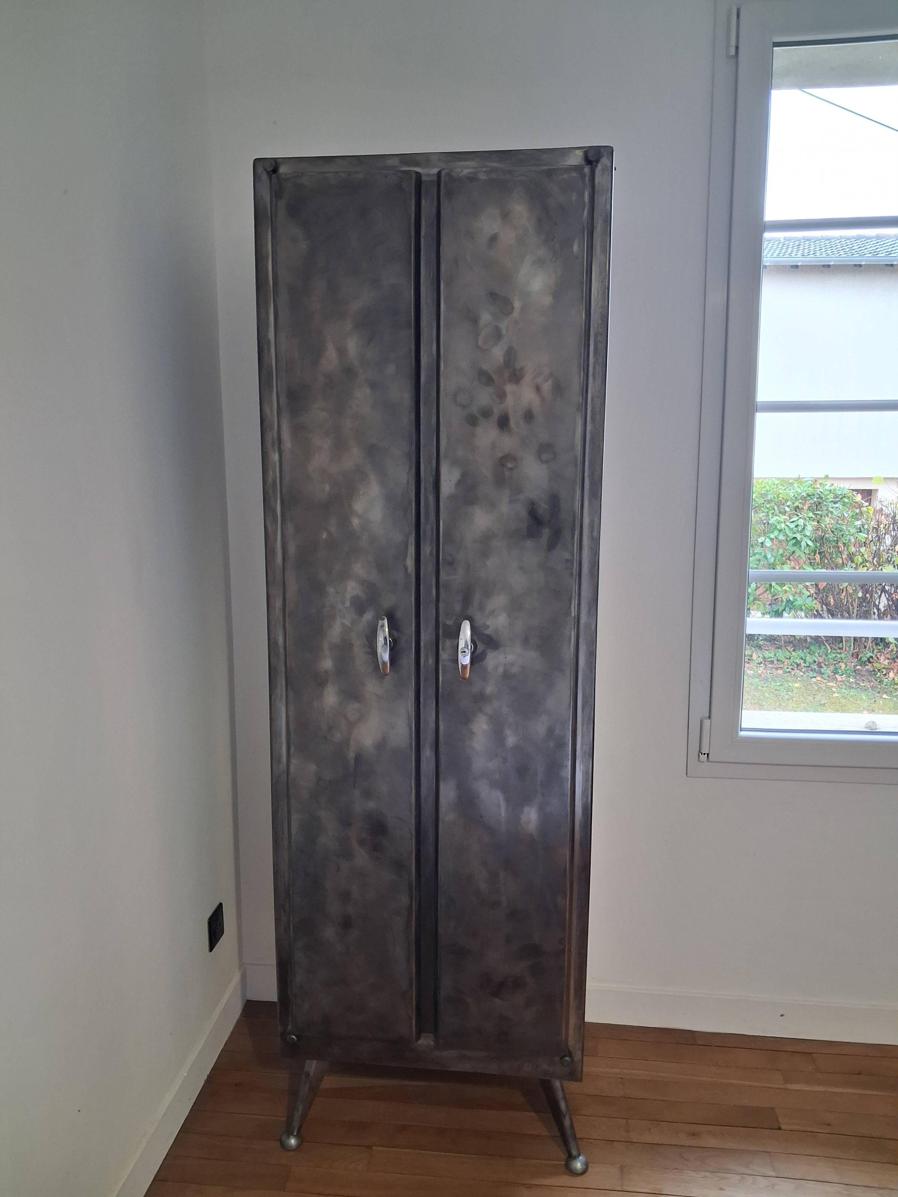 1960s factory infirmary metal cabinet with ball feet and compass.