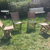 Four teak chairs