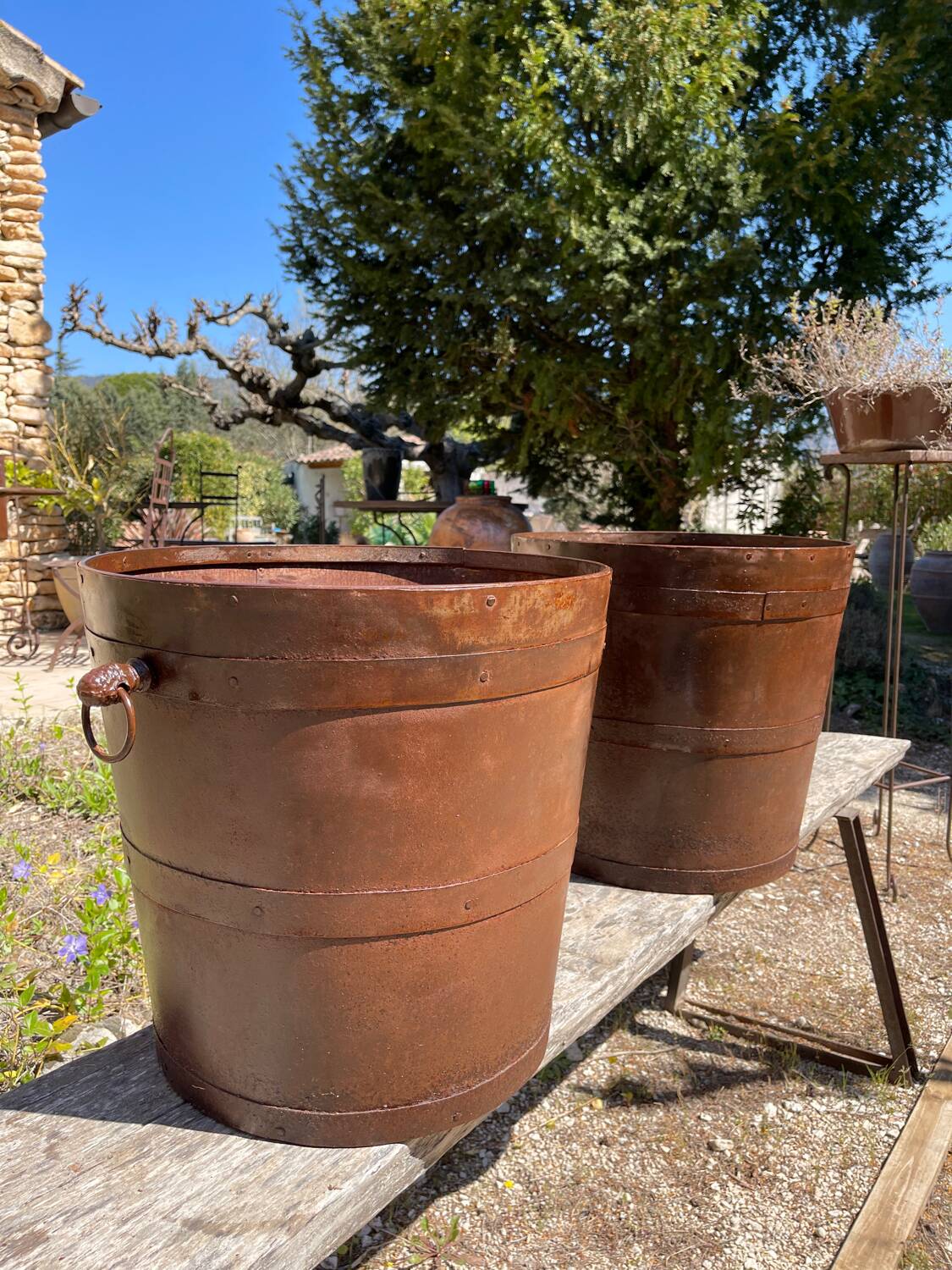 Riveted iron cache pots