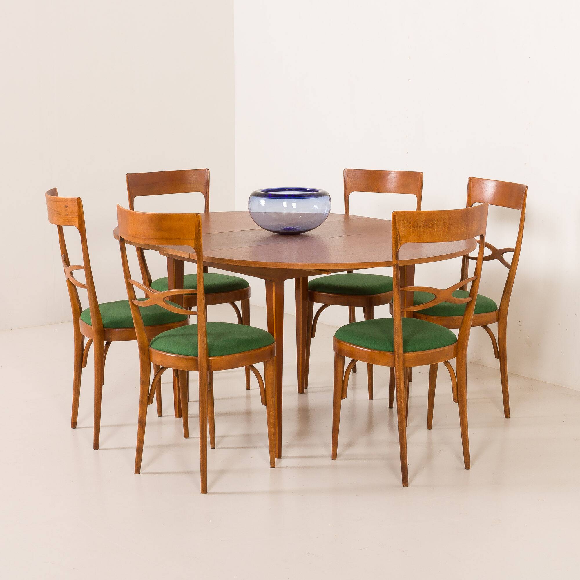 Scandinavian round teak table with hidden extension, 1970s