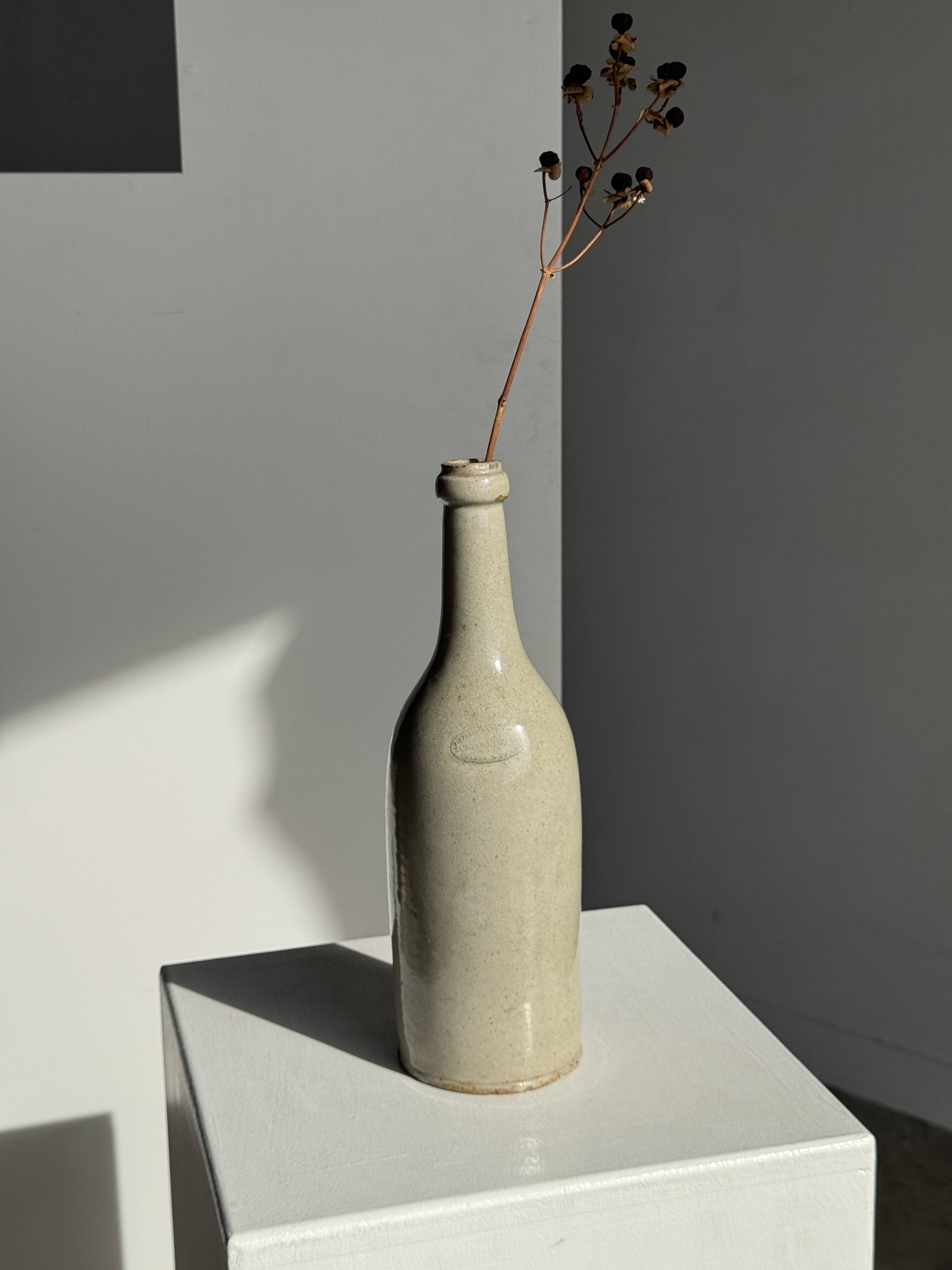 Bouteille vintage en grès beige moucheté H31