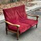 Vintage 2-seater sofa in solid wood and burgundy velvet from the 20th century