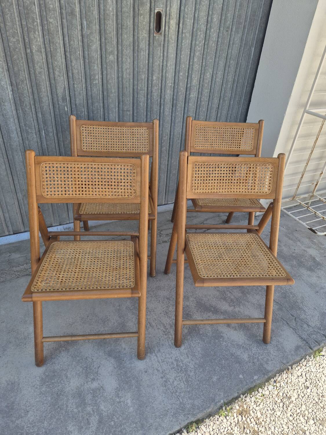 Set of 4 vintage Italian folding chairs in cane 1970s