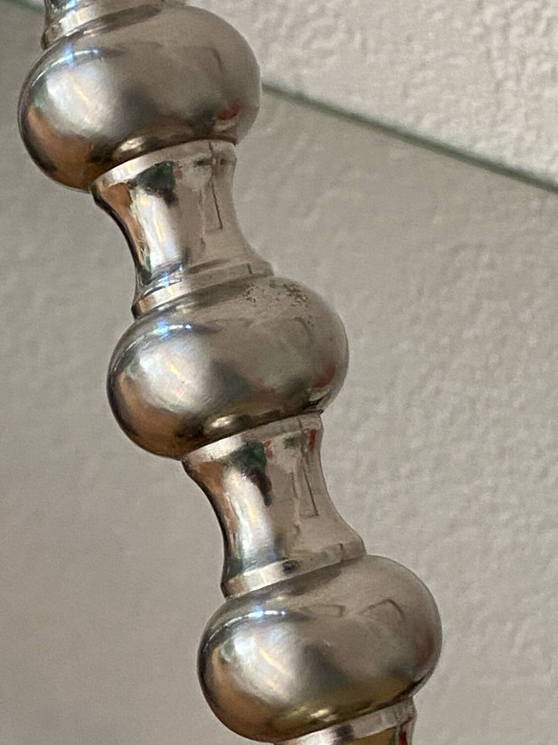 Silver and gold metal candle holder