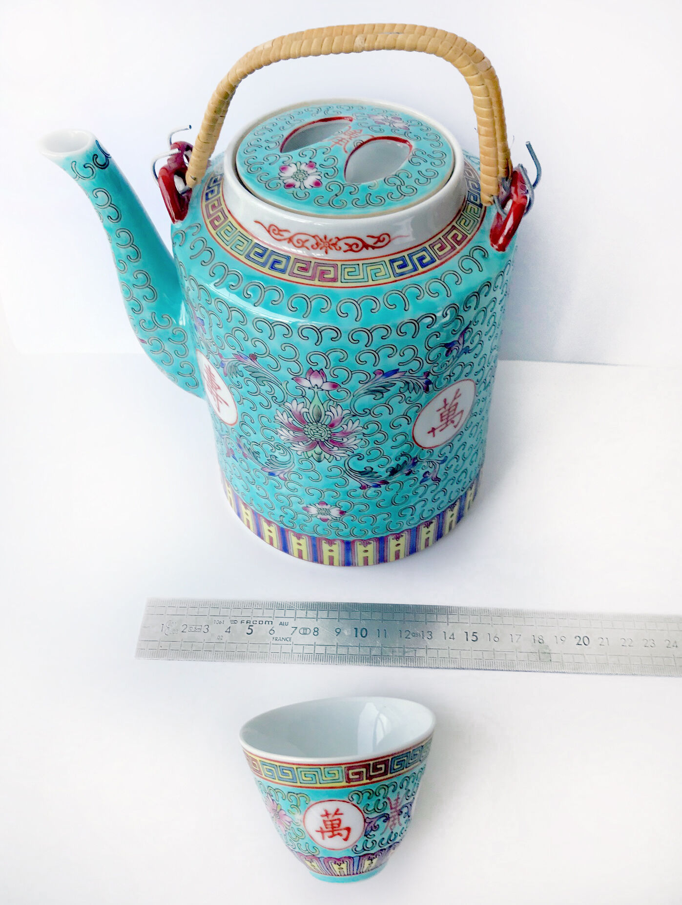 Chinese porcelain tea service with wicker basket