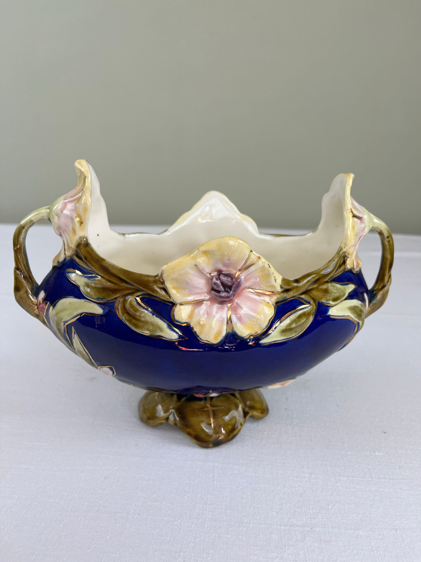 Art Nouveau navy blue barbotine bowl with raised floral decoration