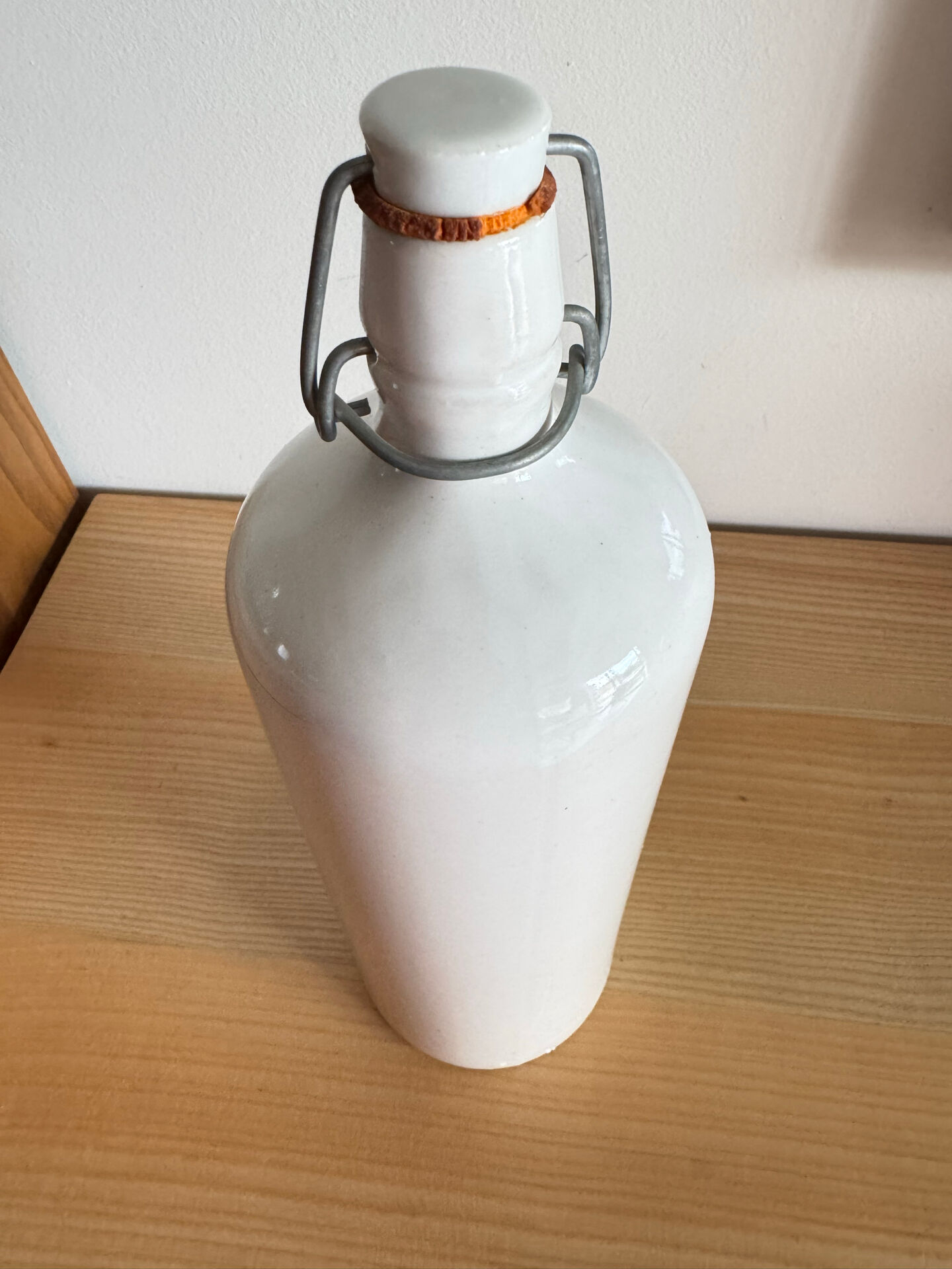 Old white ceramic bottle