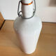 Old white ceramic bottle