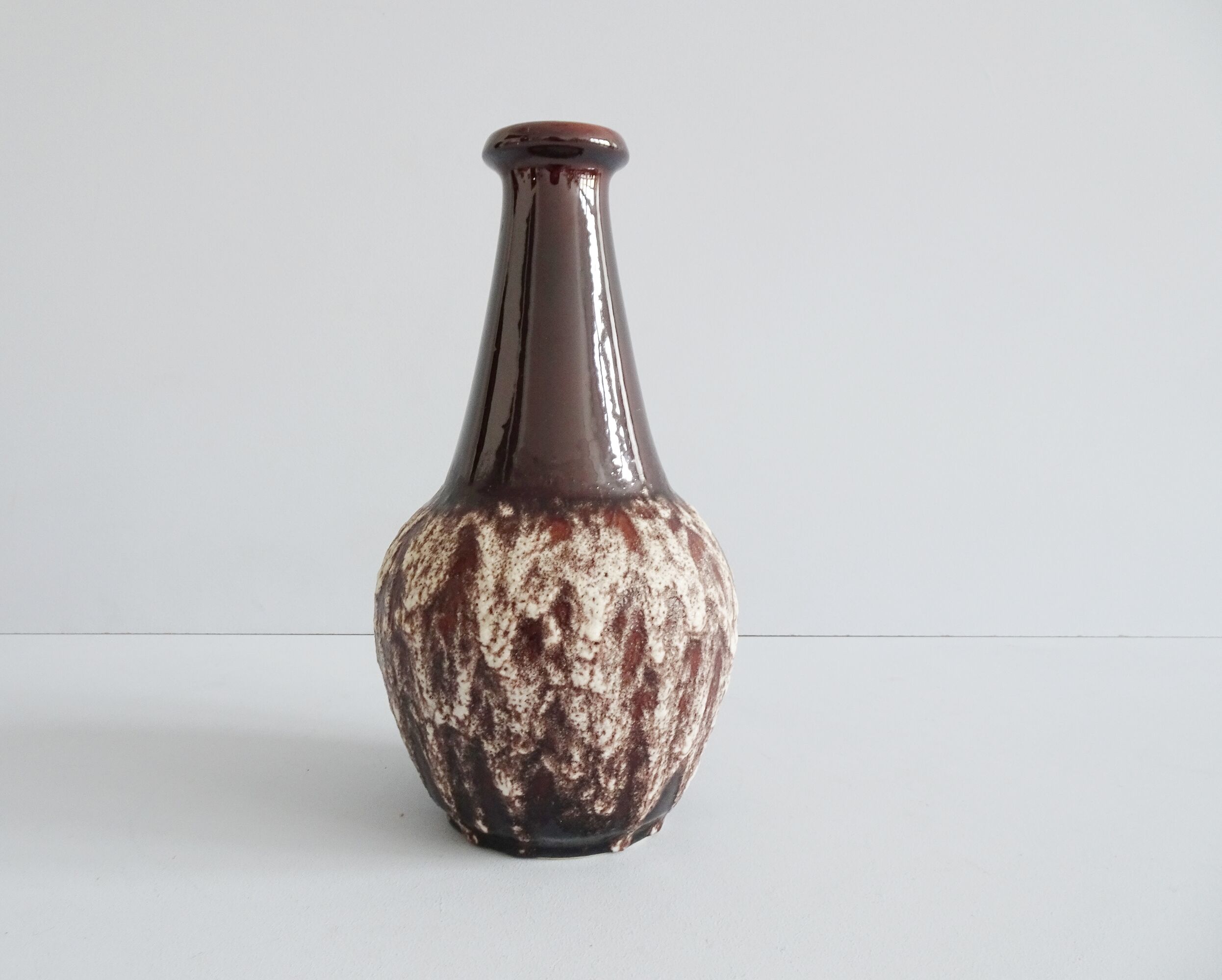 Bay ceramic pitcher with handle and fat lava glaze