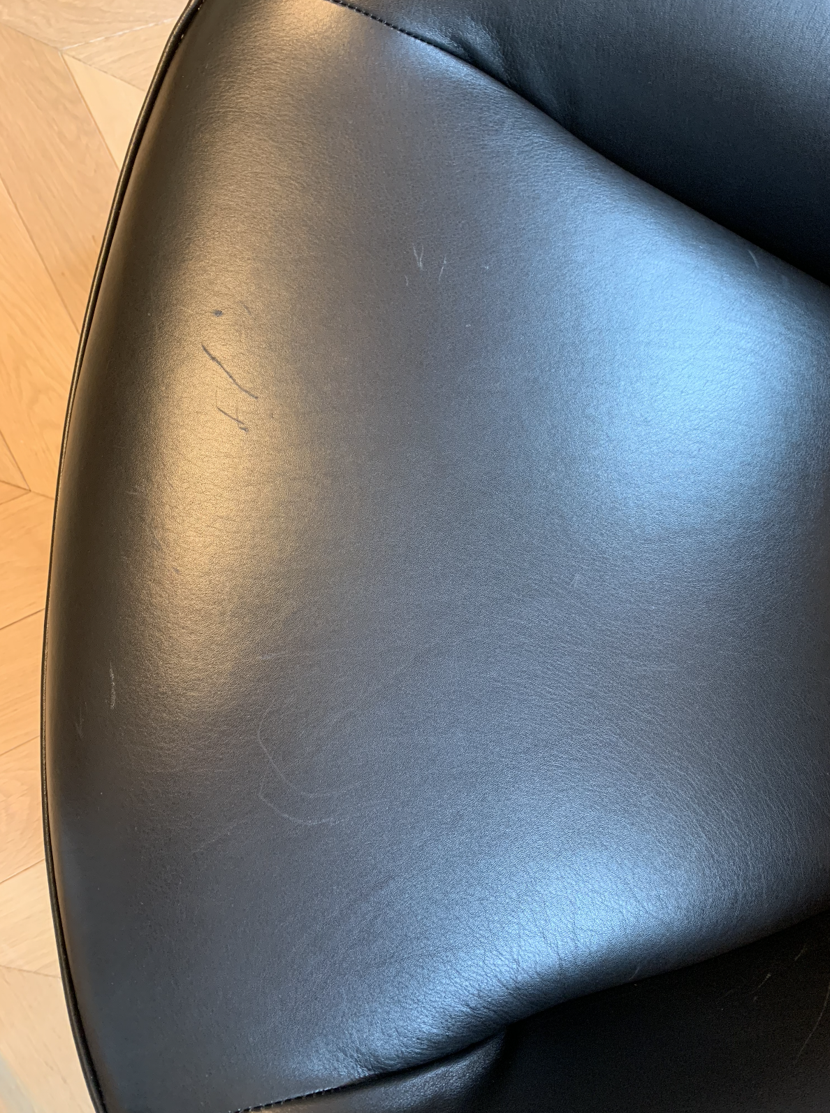 Roche Bobois leather spoutnik armchairs