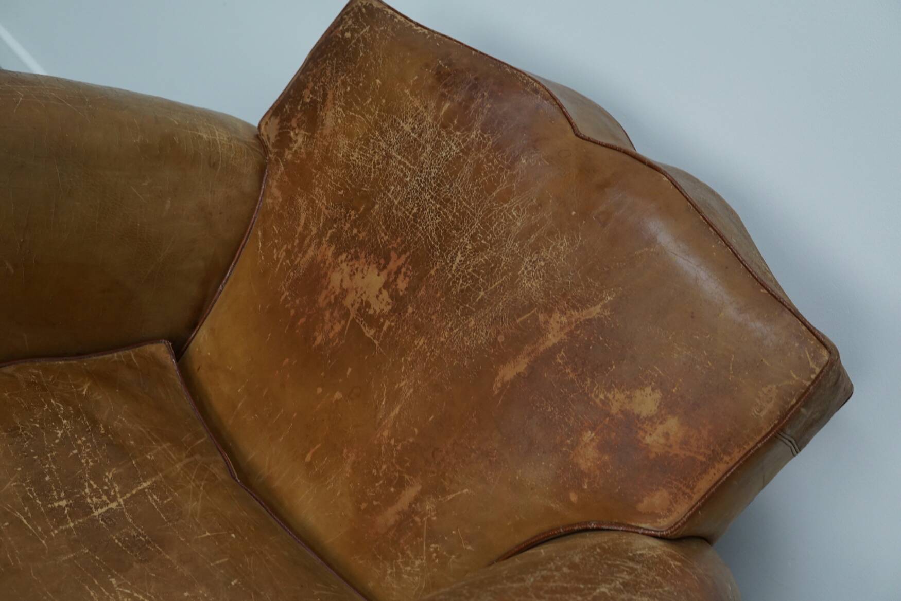 Pair of French club chairs with moustache back in cognac leather, 1940s