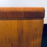 Bedside table assigned to Charlotte Perriand for Les Arcs, in pine, circa 1960.