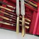 Service 20 couteaux de table lame acier manche corne