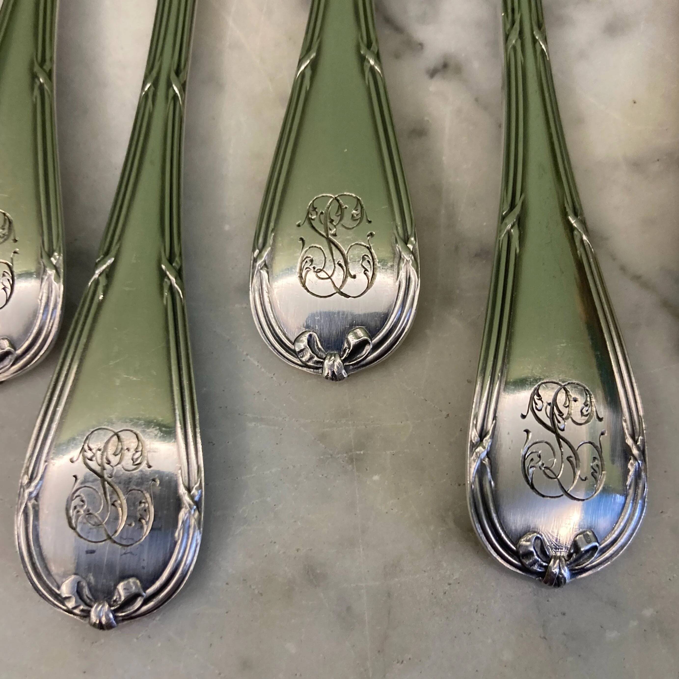 Christofle house 12 crossed ribbon oyster forks