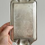 Metal butter dish and thick rectangular glass bowl.