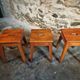 Set of 3 vintage French wooden stools from the 1950s.