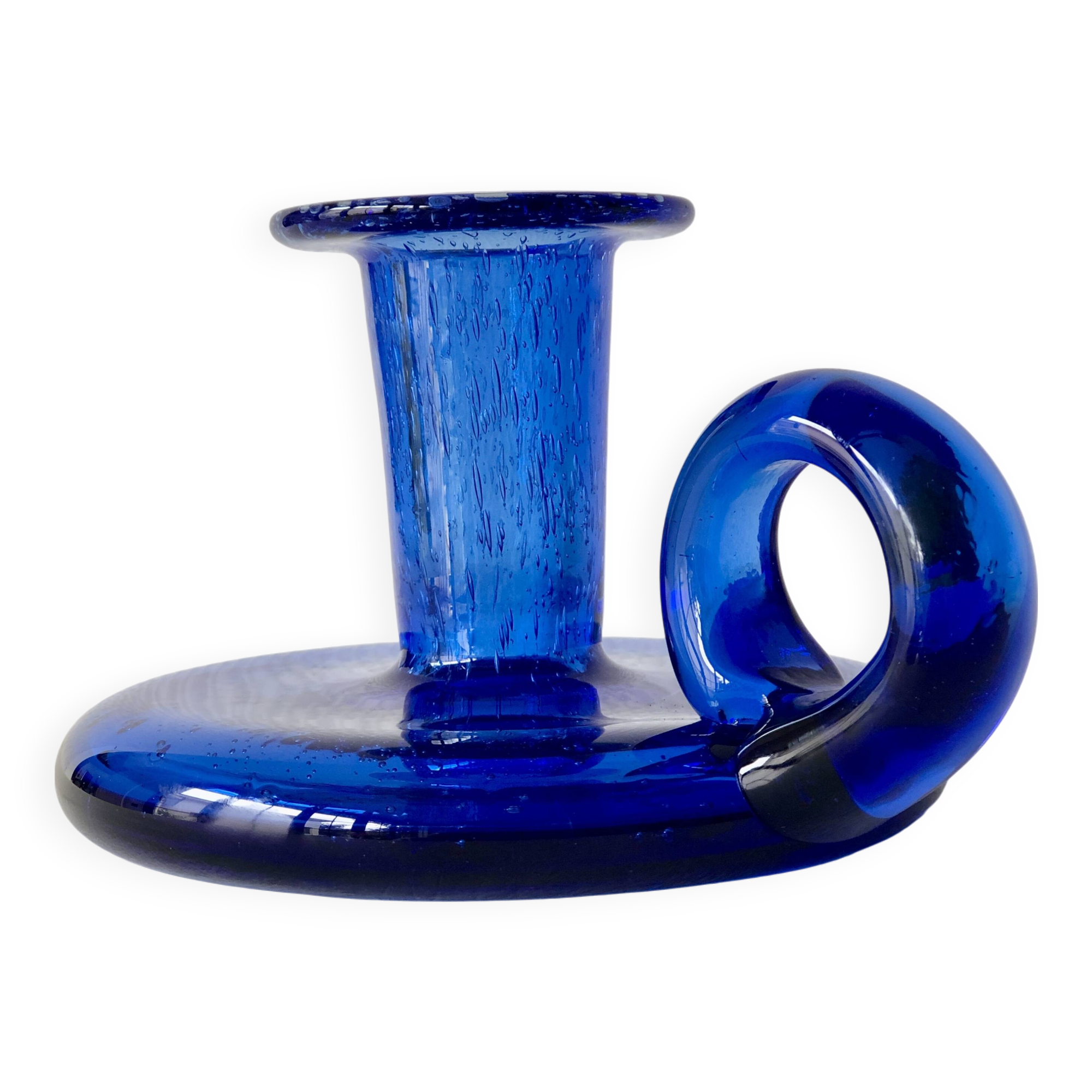 Bougeoir en verre coloré en forme de fleur. Large catalogue