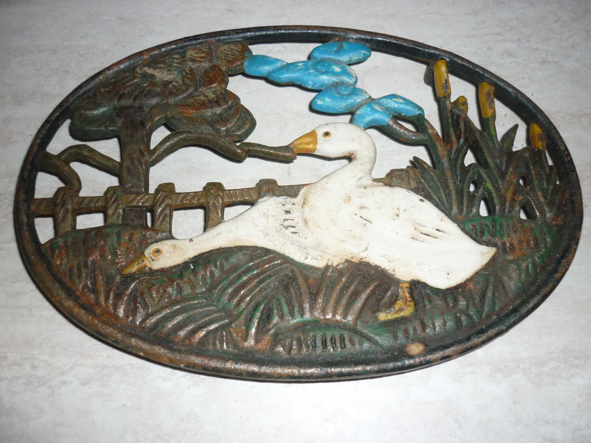 Underside of flat couple of steel geese