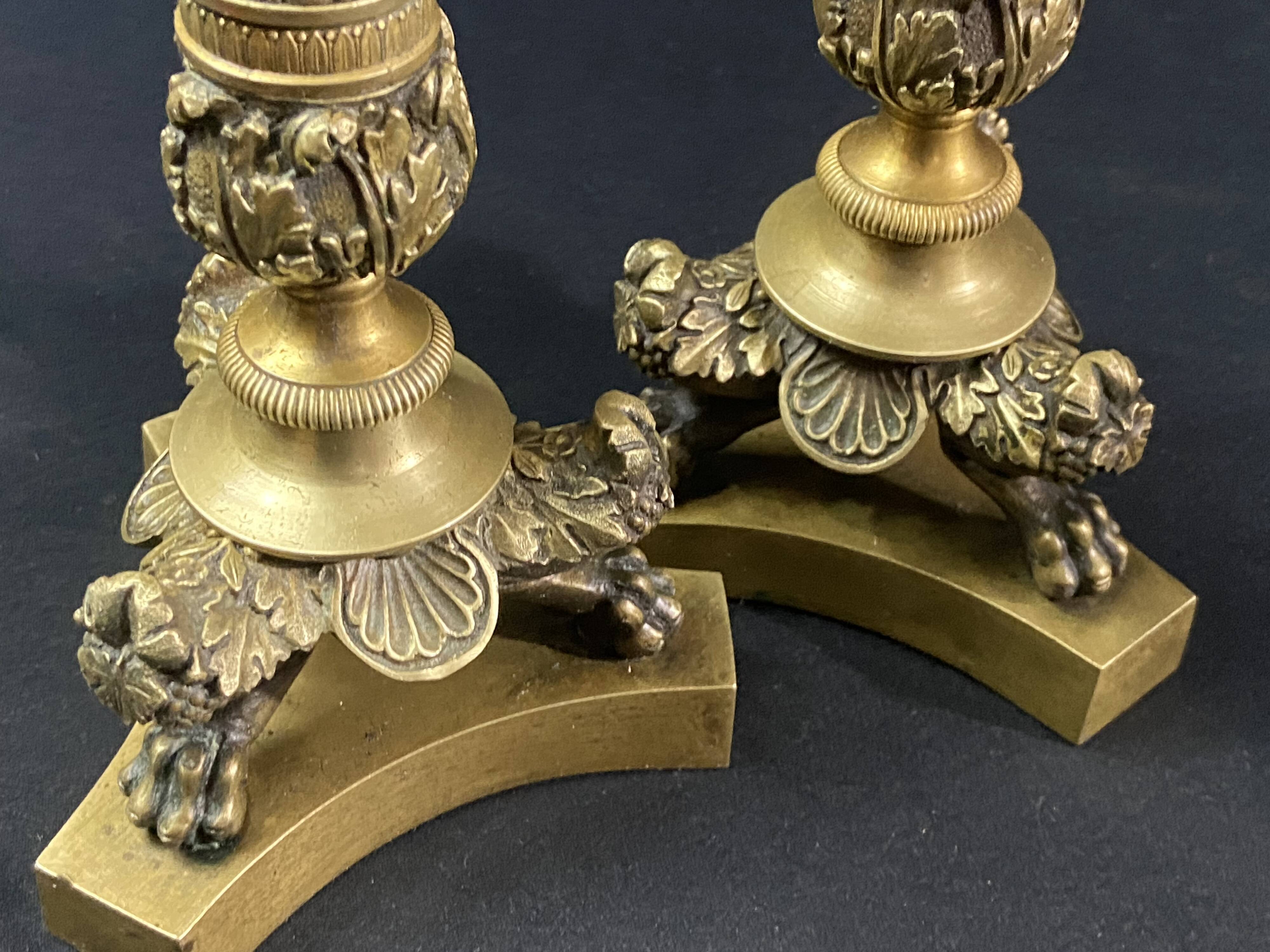 Pair of gilt and chiseled bronze candlesticks from the Restoration period