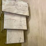 Brass and marble trundle table