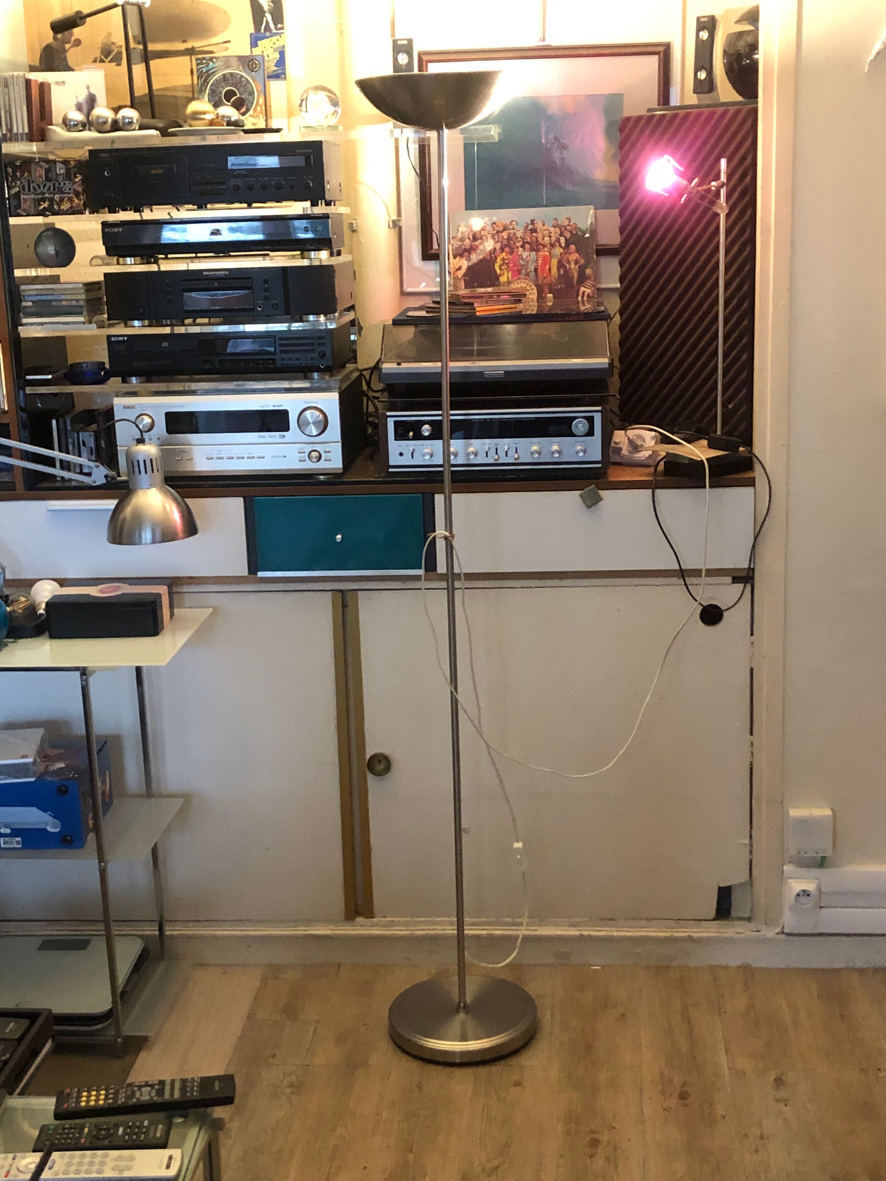 Discreet brushed metal floor lamp