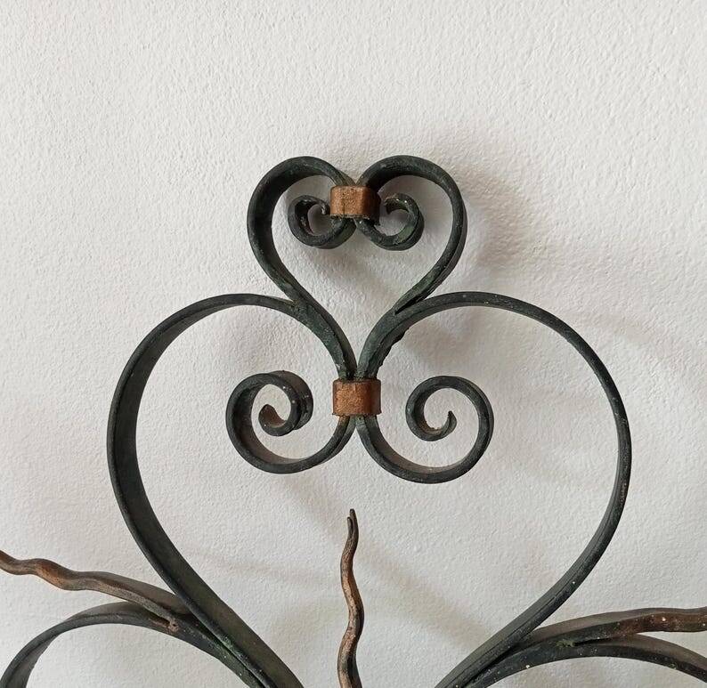 Antique wrought iron wall light from the 50s