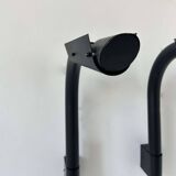 Pair of vintage wall lights, tubular and perforated black metal, Parscot France 1980