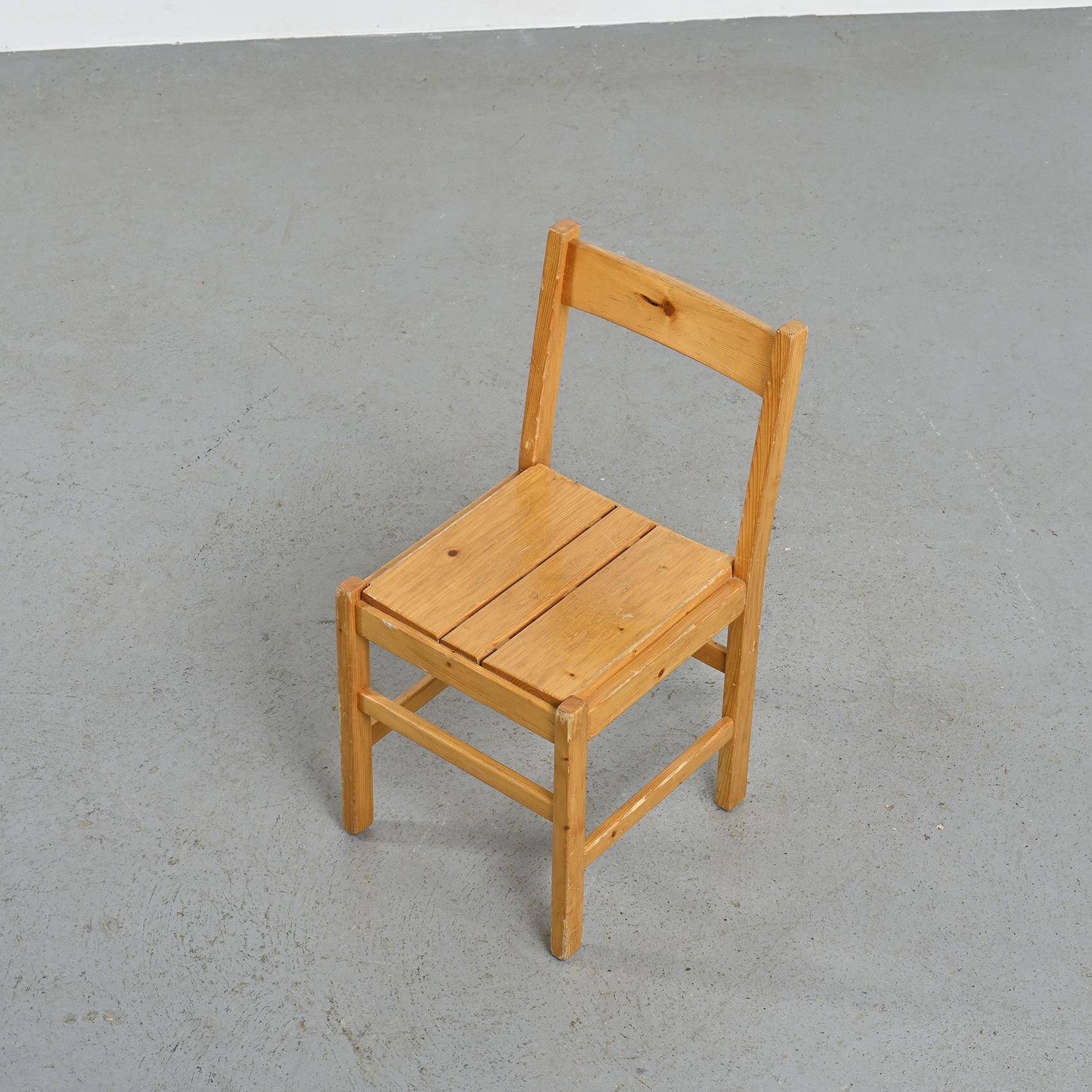 Set of six solid pine chairs by Maison Regain