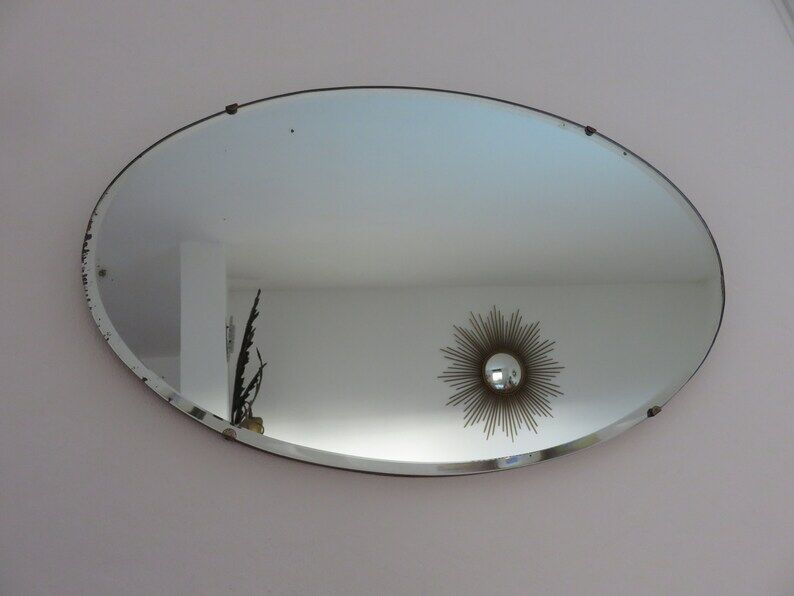 Beveled wall mirror, oval, on wood, with chain Art Deco years 30 40