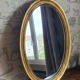 Oval mirror in gilded wood 67X52