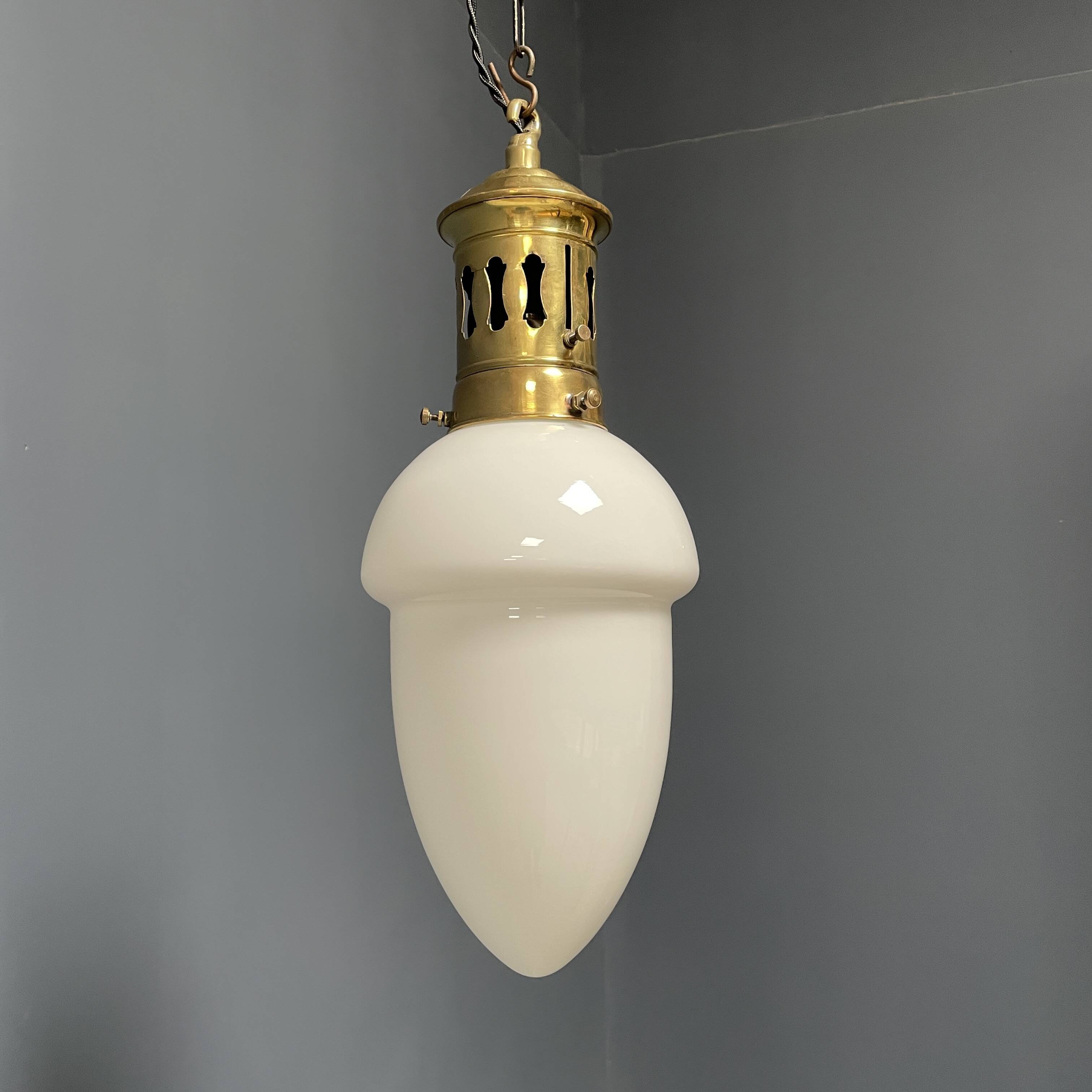 Opaline glass pendant lamp with elegant brass fixture