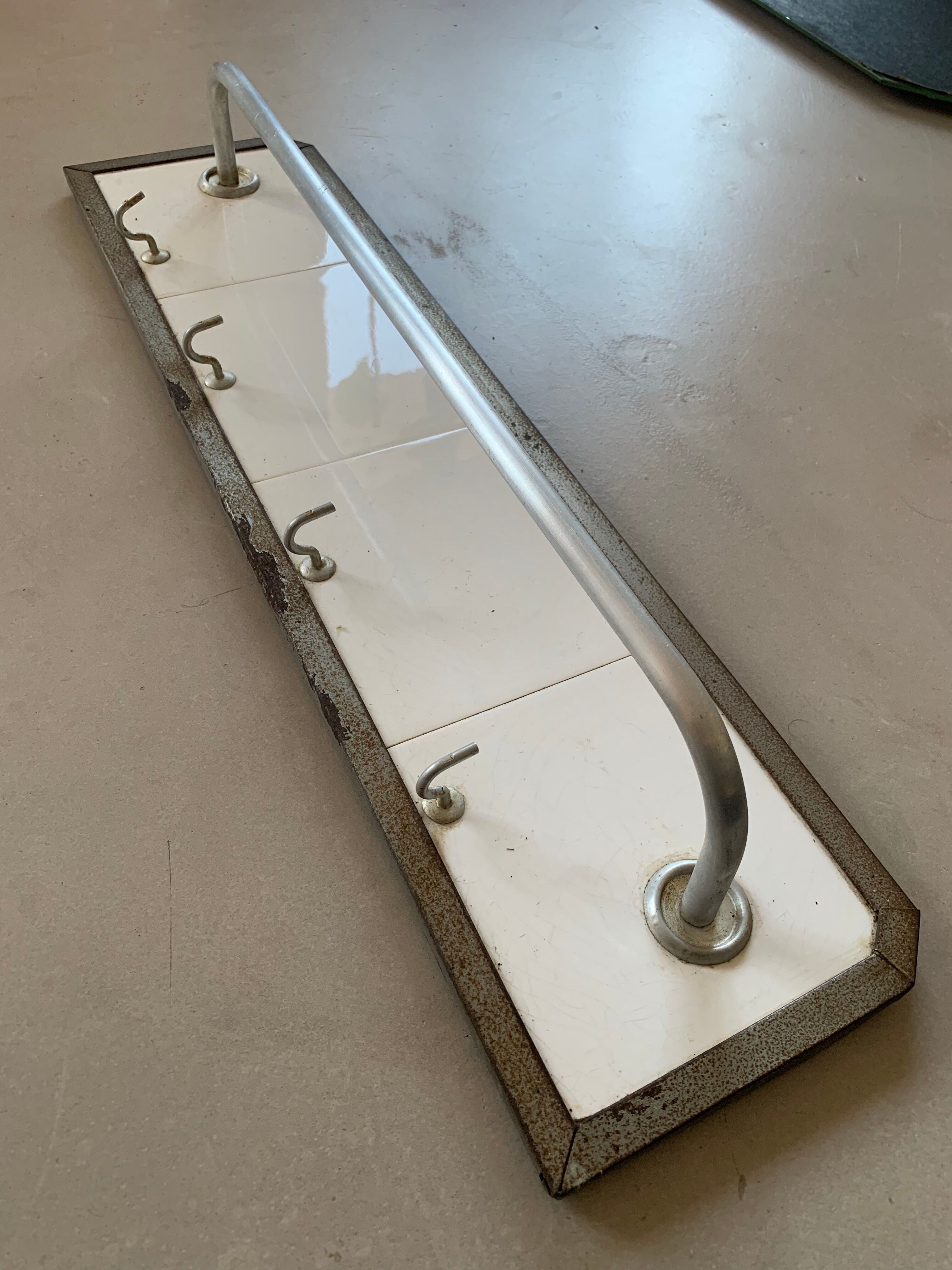 Antique tiled tea towel holder