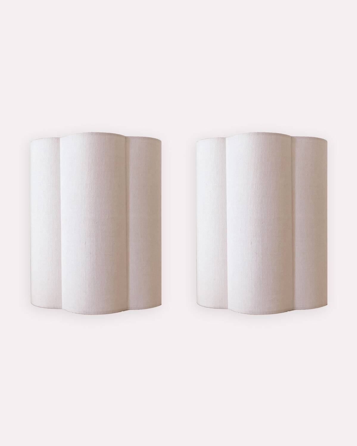 Pair of ecru linen wall lights