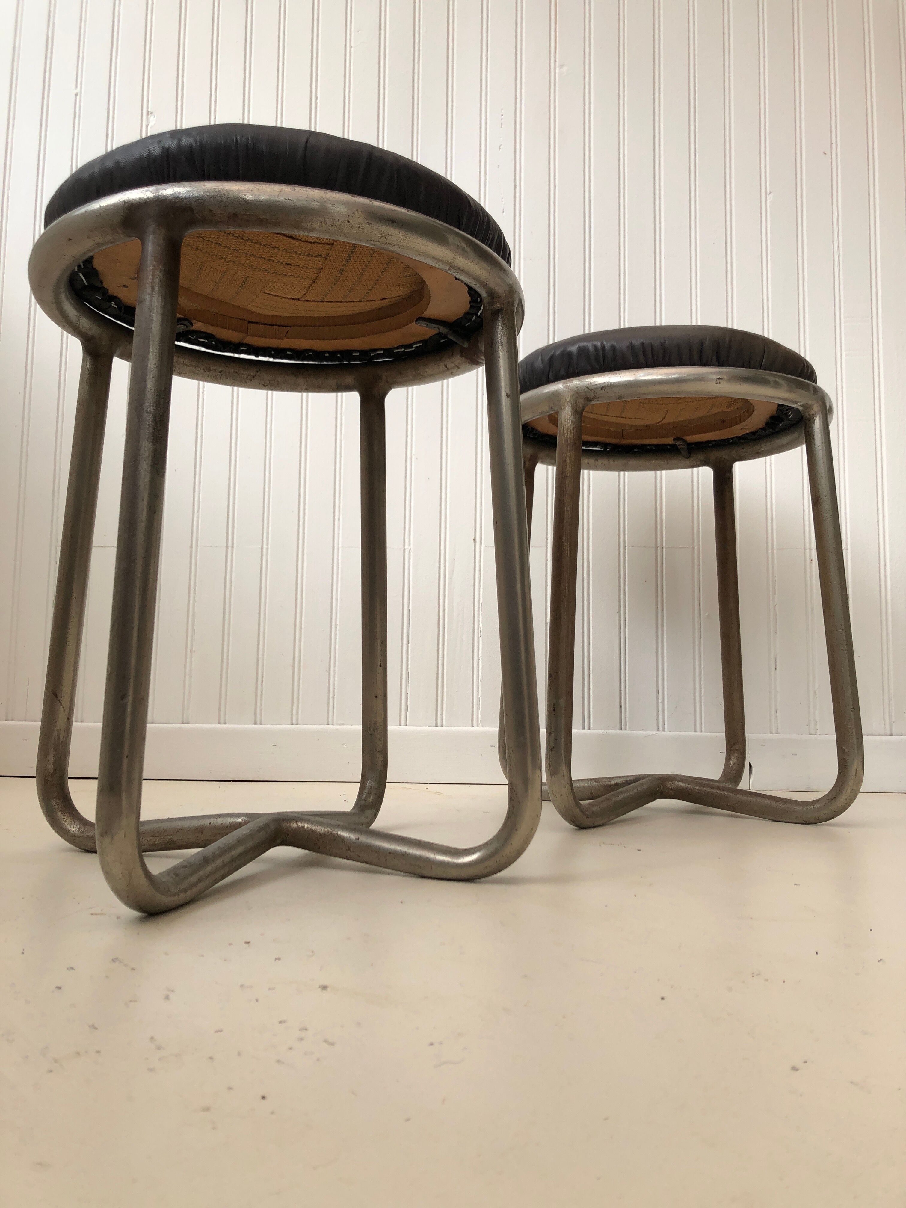 Pair of metal and leather stools
