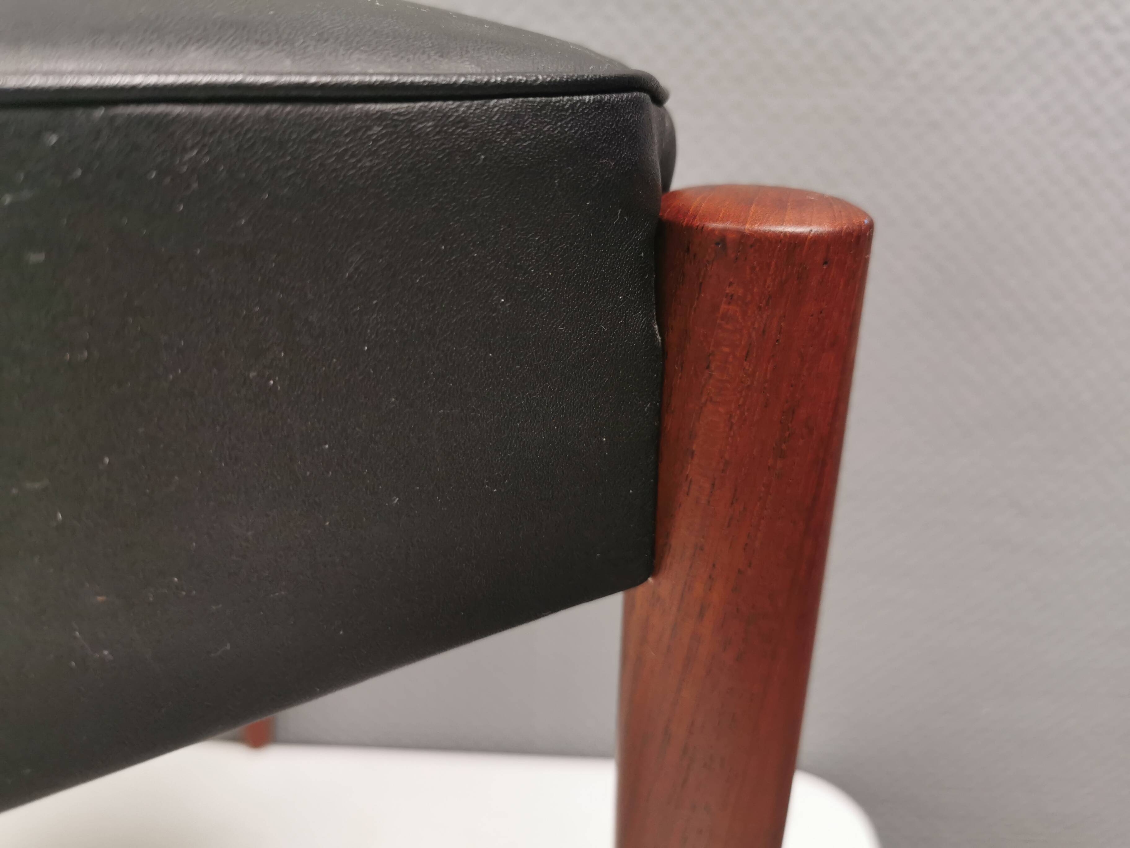 Footstool with teak wood legs and black skai (imitation leather) 1970s