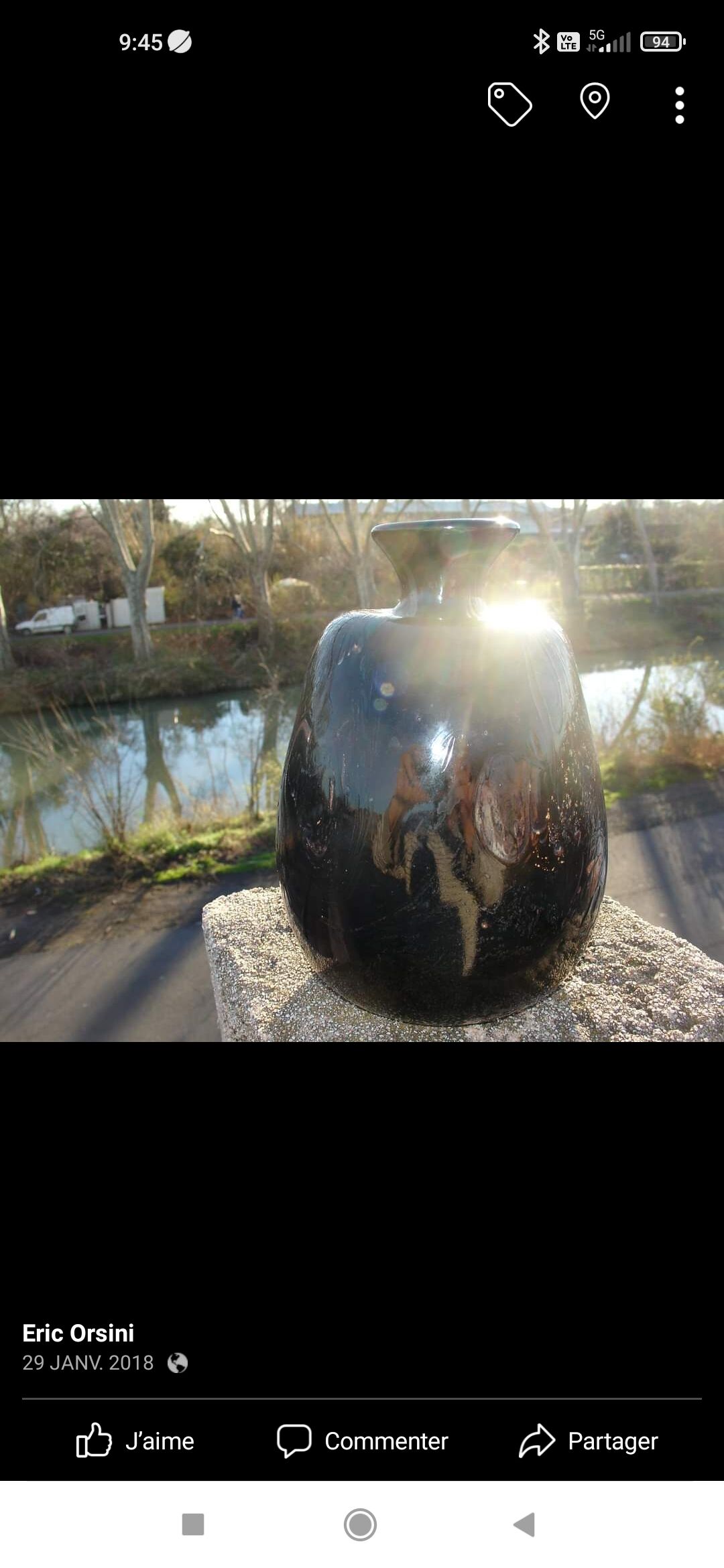 Vase in multi-layered black glass paste with inclusions of gold and other colors, signed by Bob le Bleïs