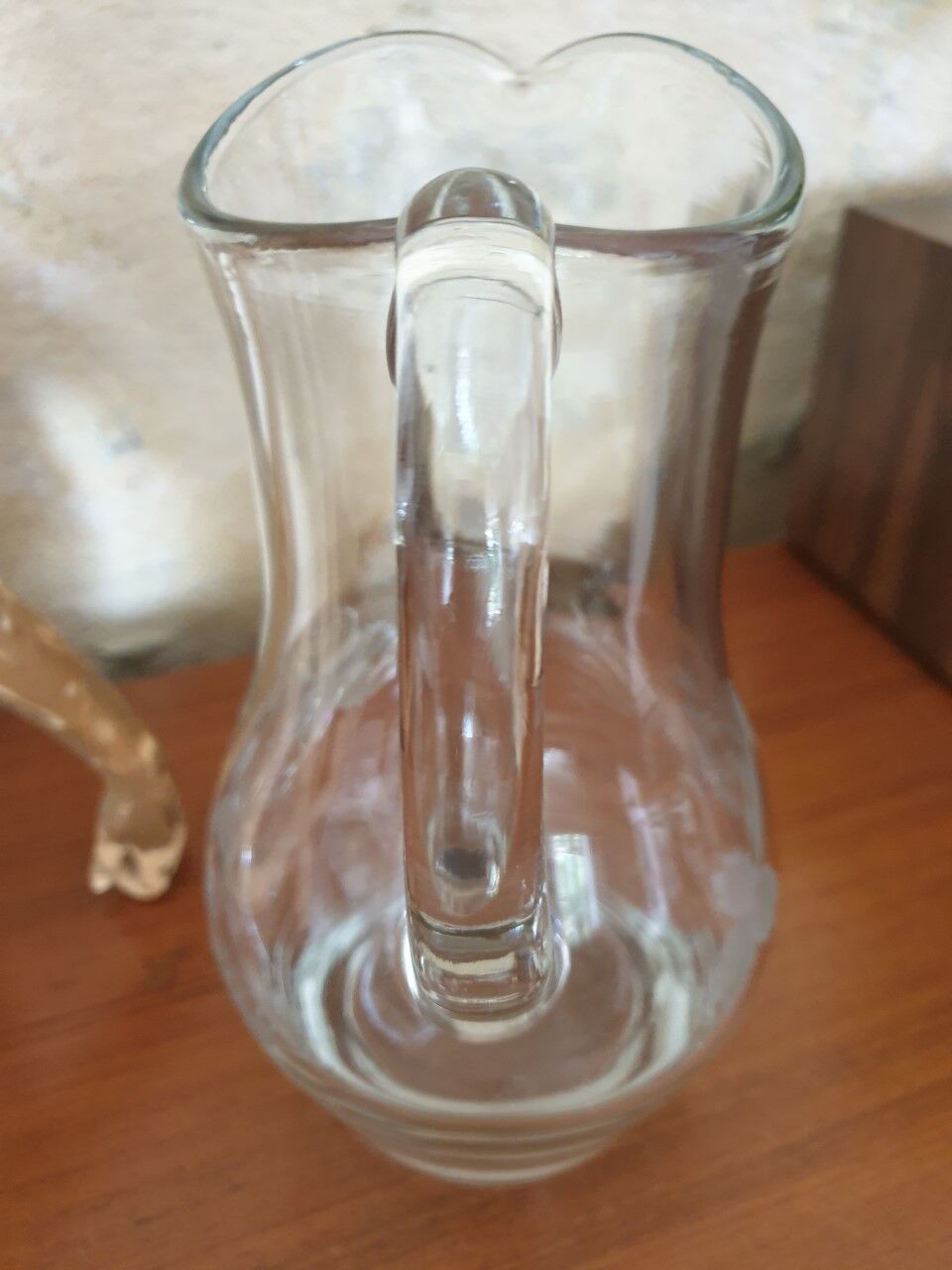 Pitcher decorating grape bunch