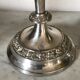 Pair of silver metal candlesticks