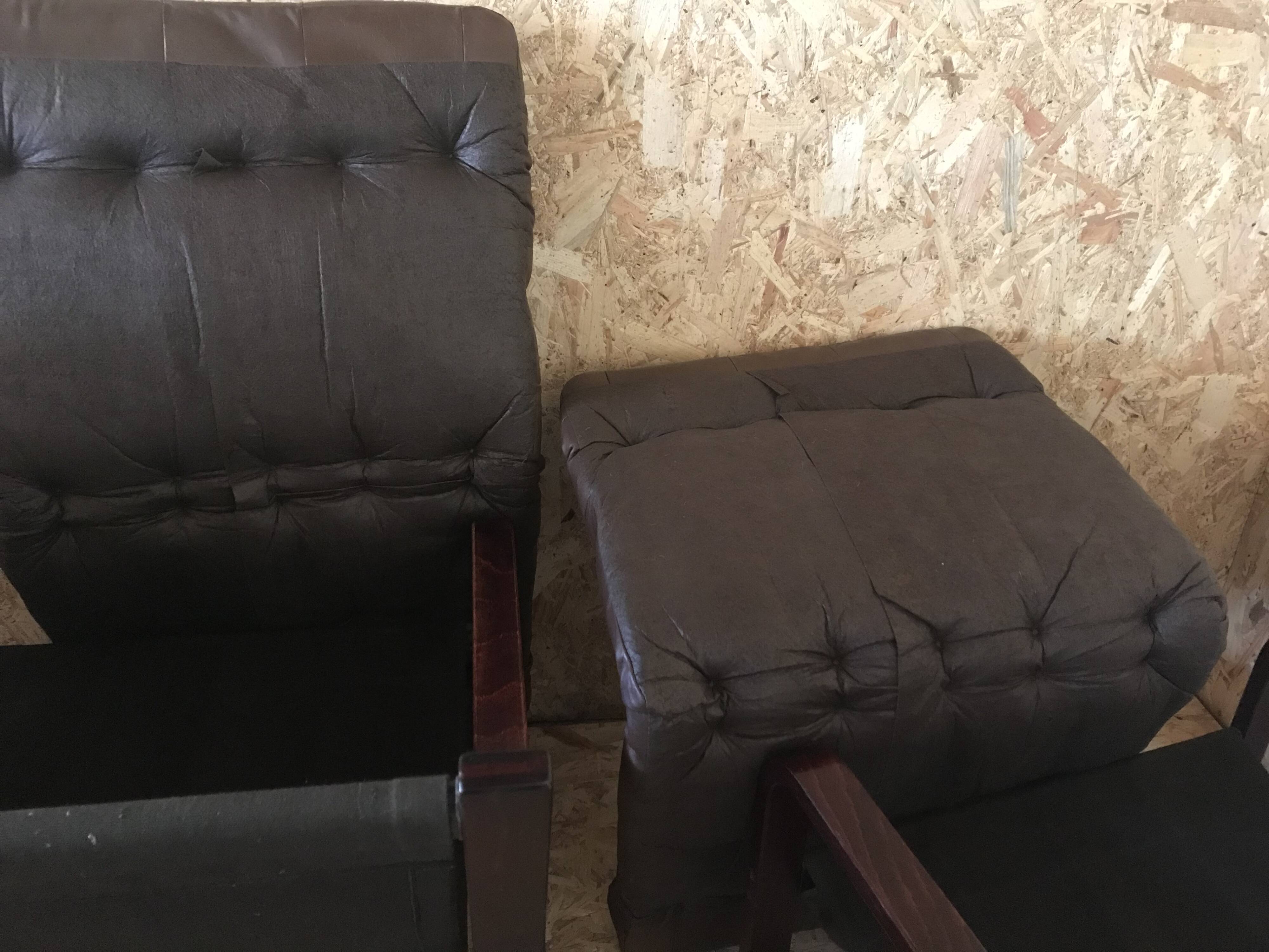 Pair of vintage armchairs in curved wood with suspended seat circa 1970-80.