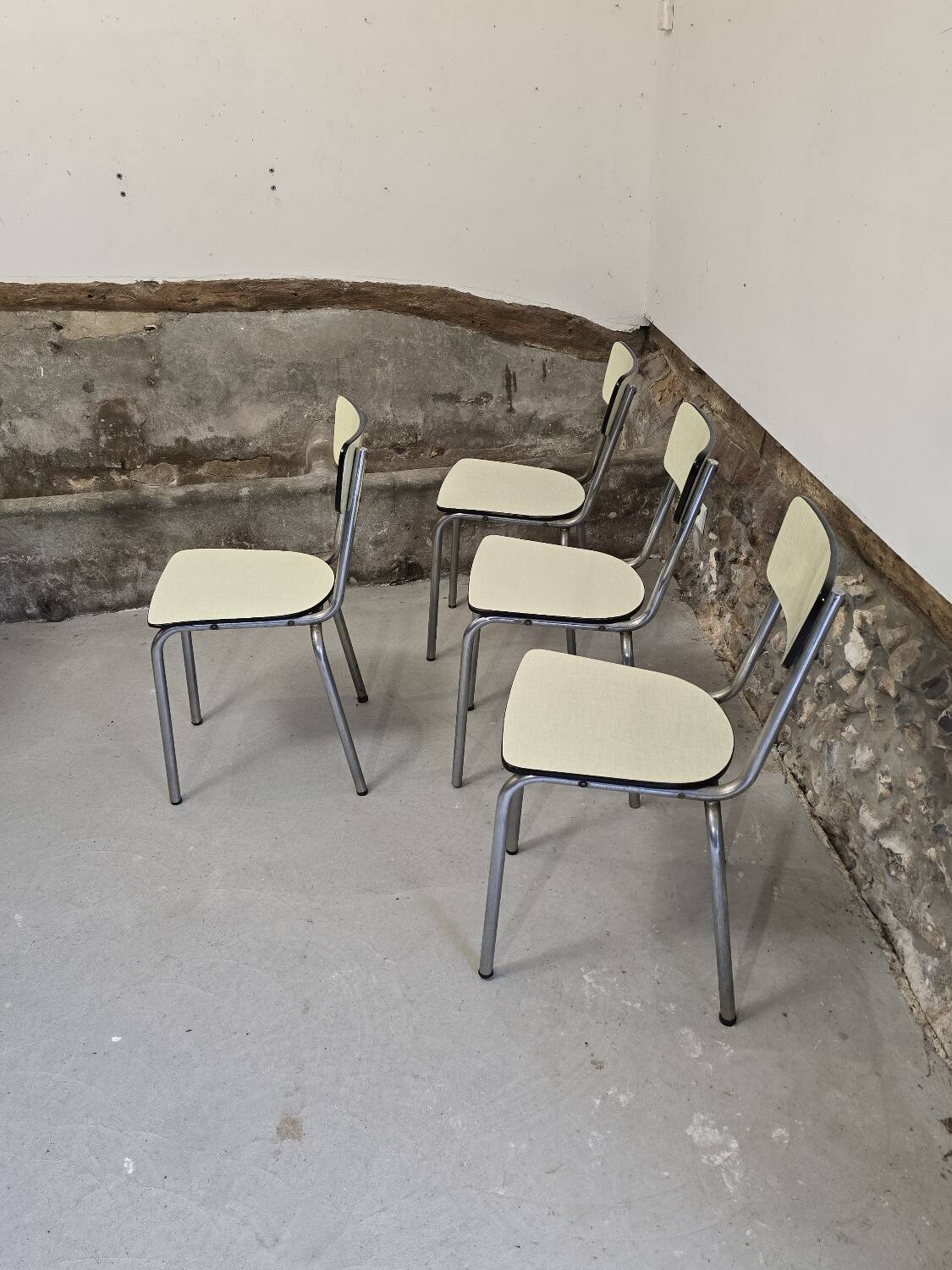 Set of 4 light yellow formica chairs