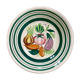 Vintage deep plate with vegetable decoration.