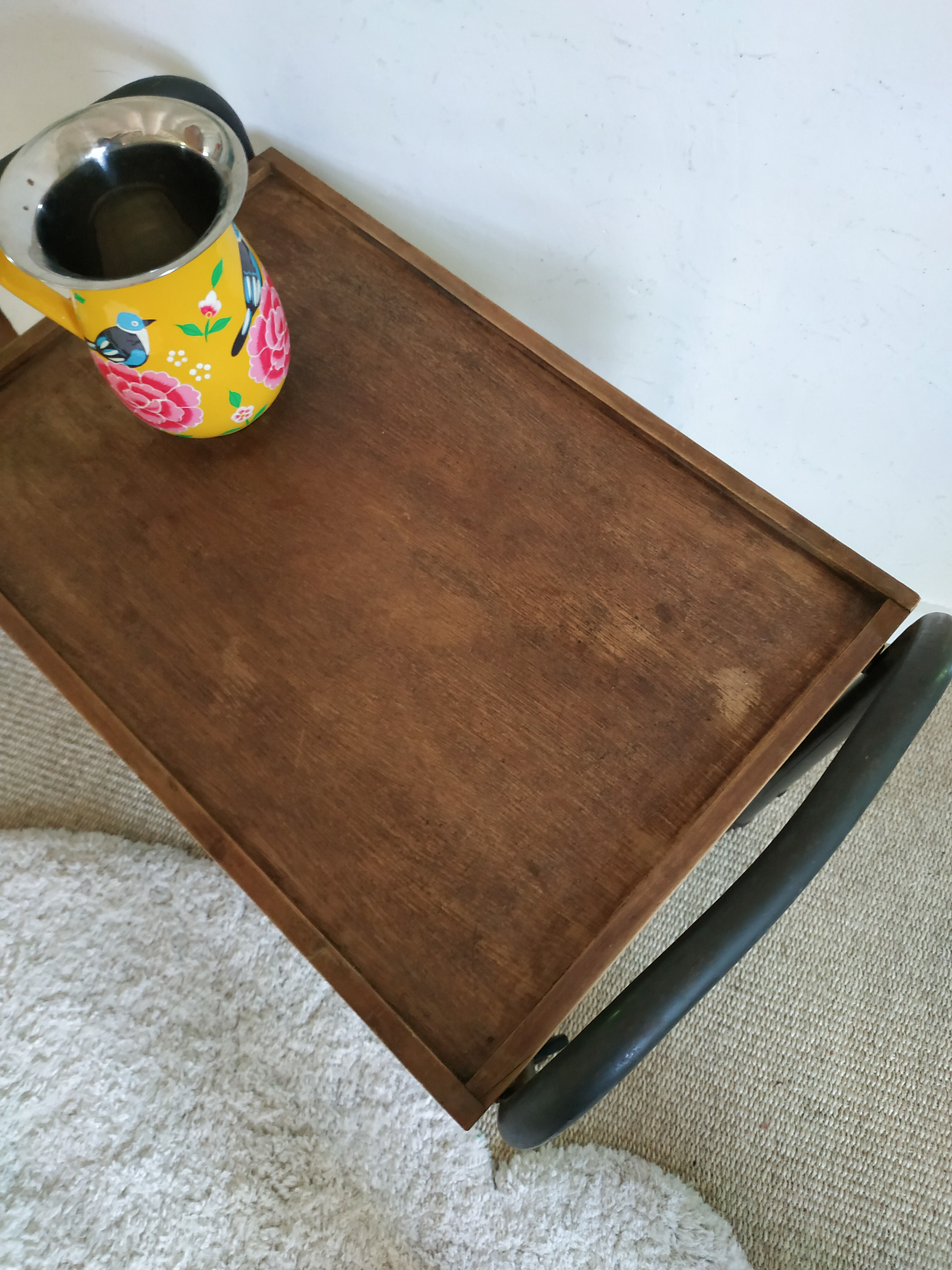 Serving table on metal wheels and antique wood