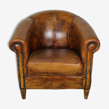 Vintage club armchair in leather color cognac Netherlands