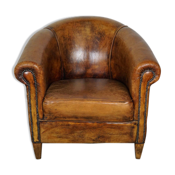 Vintage club armchair in leather color cognac Netherlands