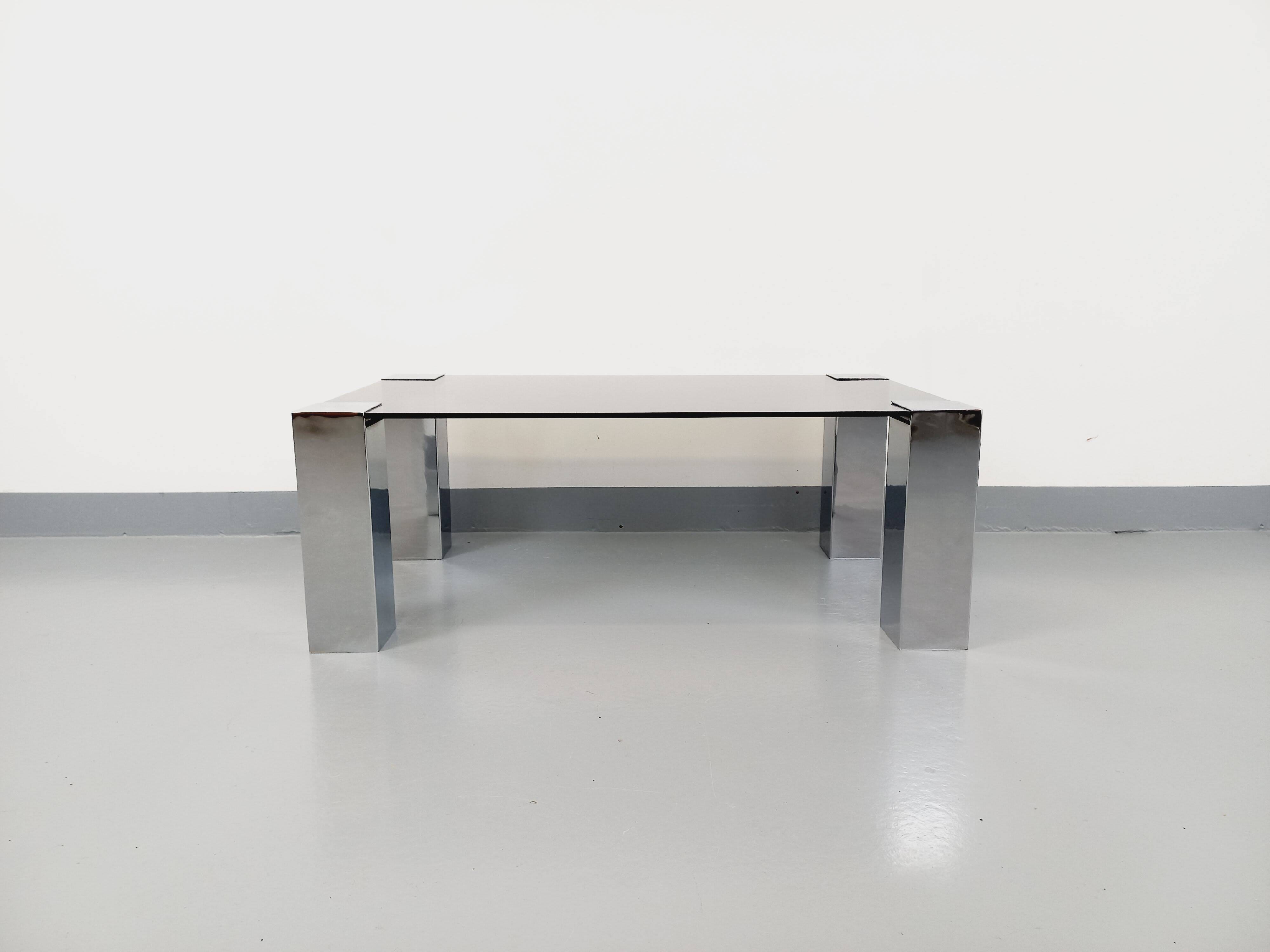 Vintage Italian coffee table Cidue in smoked glass and chrome metal from the 70s