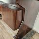 Art Deco executive desk in exotic wood, glass, and brass.
