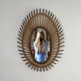 Rattan mirror in the shape of an eye