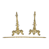 Pair of gilded bronze andirons decorated with serpents.
